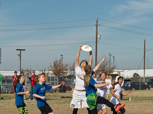 Nichole Kwee comes down with the disc. Photo by Robert Brazile