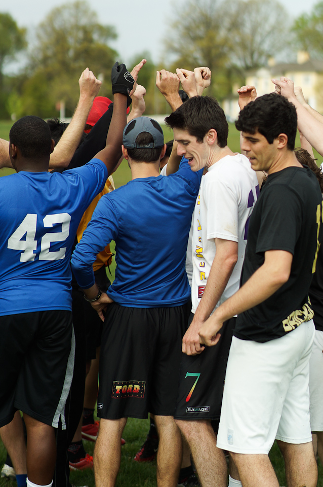 Philadelphia, PA: Players break their huddle with a cheer at the tryouts for the new Philadelphia Open division Ultimate Frisbee team. May 3, 2014. Photo by Sean Carpenter - UltiPhotos.com