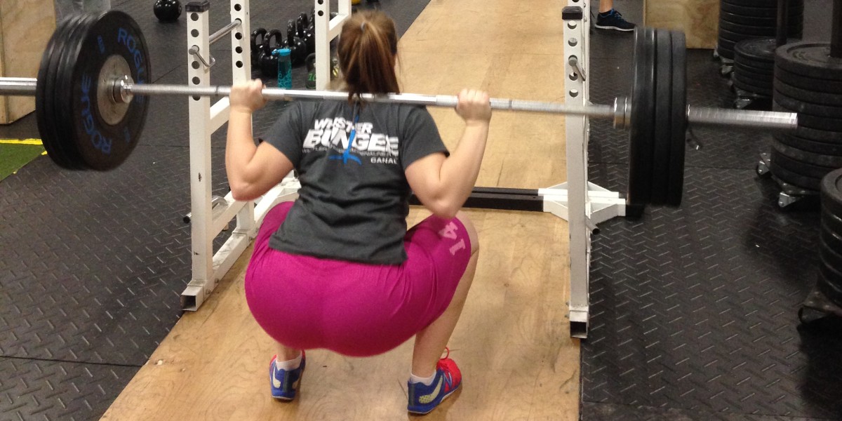 Brianna VanderGriendt in the weight room