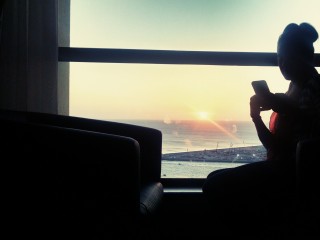 Watching the first not hazy sunset from our room.