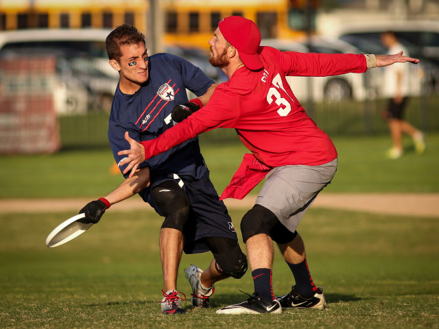 Kurt Gibson of Doublewide winds up for a huck against Machine in a placement game at the 2013 USA Ultimate National Championships. Photo by Christina Schmidt, UltiPhotos.com.